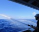 China slams US for sending warship near disputed reef