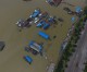 China issues fresh alert after 180 killed in floods