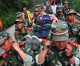 China sends 18,000 troops for rescue efforts
