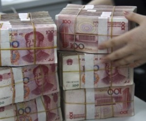 Yuan continues slide, PBOC approves