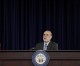 In surprise vote, Fed continues stimulus plan