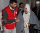 Under fire, relief convoy delivers aid in Homs