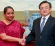 China, India vow to step up global coordination