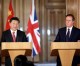 Xi ends UK visit with promises to open “golden era”