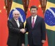 Hours after swearing in, Temer arrives in China